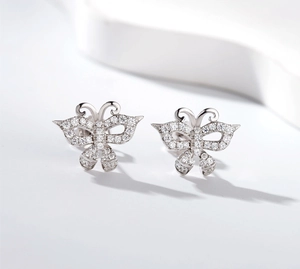 Macro view of butterfly earrings featuring high-quality micro-pave cubic zirconia on S925 silver