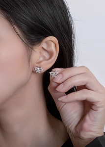 Close-up of elegant S925 sterling silver butterfly earrings with sparkling cubic zirconia