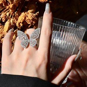 Exquisite sterling silver butterfly ring with cubic zirconia stones on model hand