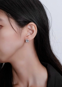 On-ear view of 925 silver square sugarloaf stud earrings with sparkling crushed ice cut