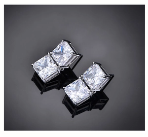 Macro shot of 8ct princess cut ice flower carbon diamond earrings in S925 silver