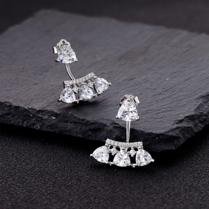 S925 silver fan-shaped stud earrings with triangle cut carbon diamonds on black stone