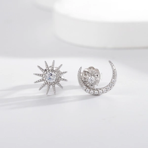 Asymmetric S925 sterling silver sun and moon stud earrings with sparkling cubic zirconia
