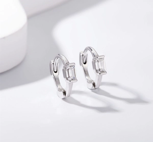 Detailed close-up of S925 sterling silver hoop earrings with rectangular cubic zirconia