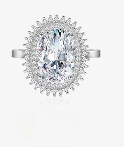 Macro shot of oval cut high carbon diamond ring with double halo setting in silver