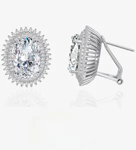 Detailed view of oval halo stud earrings with double row of cubic zirconia and Omega clips