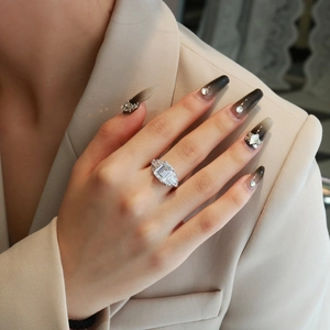 Elegant 8x10mm emerald cut stone ring with tapered side baguette diamonds on S925 silver