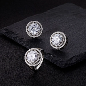 Close-up of S925 sterling silver jewelry set featuring 10mm halo round-cut diamonds