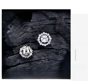 Macro detail of S925 sterling silver hallmarked earring with yellow carbon diamond halo