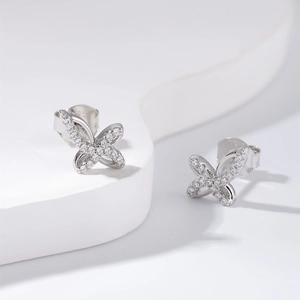 Minimalist S925 sterling silver bow stud earrings with sparkling cubic zirconia stones