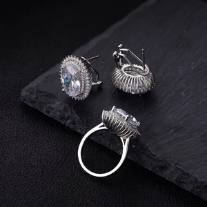 Oval silver stud earrings and matching ring set with sparkling high carbon diamonds
