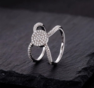 Macro view of wide S925 silver ring featuring micro-pave diamond circular disk design
