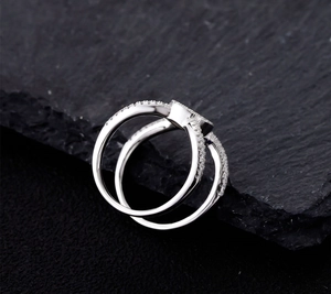 Close-up of a double-band S925 silver ring featuring micro-pave white zircon details