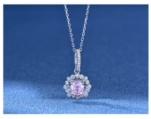 Detailed view of flower-shaped 925 silver necklace with a 6mm pink central gemstone
