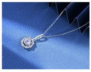 Detailed macro view of 6mm yellow diamond pendant necklace with 925 sterling silver chain