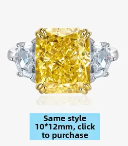 Makroaufnahme eines 10*12mm gelben Edelsteinrings mit Trapez-Seitendiamanten im Detail