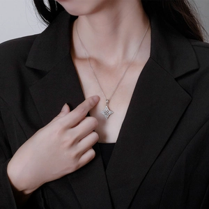 Elegant S925 silver north star necklace with micro-pave crystals on a female model