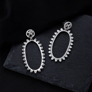 Exaggerated S925 sterling silver oval hollow drop earrings with micro-set zircon accents