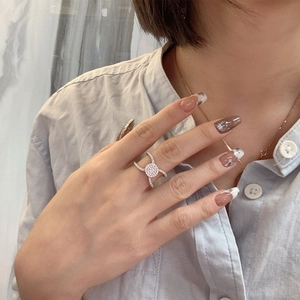 S925 silver wide ring featuring a double cross design and a sparkling pavé diamond disk