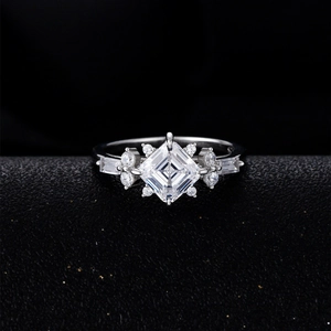 925 silver princess cut square cubic zirconia ring with side baguette accents on black stand