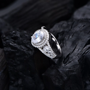 Luxury oval cut 7x9mm simulated diamond ring in 925 silver with double halo pave setting