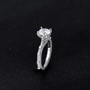 Luxury brilliant round cut 925 silver wedding ring featuring pavé set sparkling gemstones