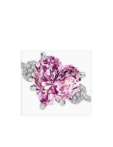 Detail of 925 silver heart ring showing professional micro-pave setting with pink stone