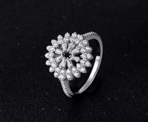 Macro side view of S925 silver flower ring with micro-pave cubic zirconia stones