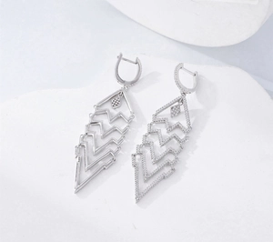 Close-up of S925 sterling silver long tassel earrings with sparkling micro-pave zircons