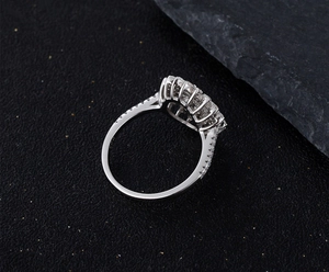 Detailed view of micro-pave floral S925 silver ring with brilliant cubic zirconia