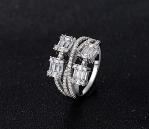 Detailed macro shot of a multi-layer S925 silver ring featuring rectangular zircon stones