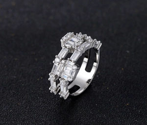 Detailed close-up of double-layer S925 silver ring with rectangular and round zirconia