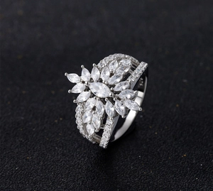 Detailed macro of S925 sterling silver ring with marquise-cut zircon sunburst pattern