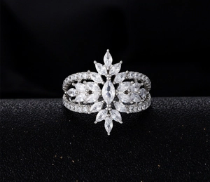 Macro detail of wheat ear design ring with marquise-cut marquise-cut cubic zirconia and silver