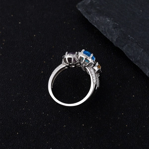 Elegant 925 sterling silver ring featuring multi-color gemstones and micro-pave setting