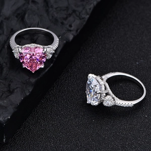 Elegant 925 silver rings with heart-shaped pink and white high-carbon diamonds on dark stone