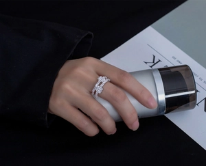Detail of S925 silver double-layer ring with emerald-cut 5A zircon on model hand