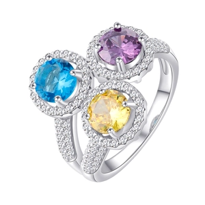 Three-stone 925 silver ring featuring blue, purple, and yellow round-cut colorful crystals