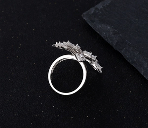 Macro shot of S925 silver stamp and marquise-cut cubic zirconia floral ring setting