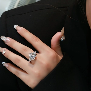 Luxurious S925 silver ring featuring a large 12mm heart-shaped pink diamond and pave stones