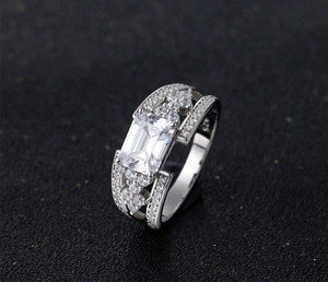 Macro shot of 925 silver ring featuring emerald cut high carbon diamond and micro-pave