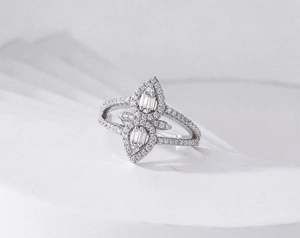 Macro shot of S925 sterling silver ring with micro-paved diamonds and baguette-cut stones