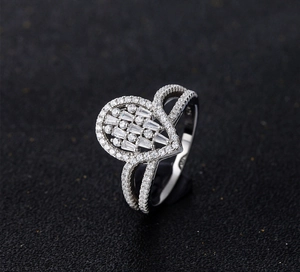 Macro shot of S925 sterling silver ring detail with pavé-set shimmering zircons
