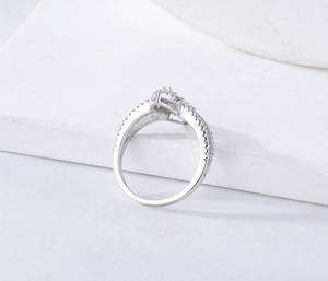 Macro detail of S925 sterling silver stamp and micro-pave diamonds on the ring band
