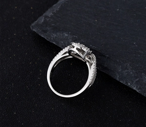 Macro shot of S925 silver ring featuring intricate micro-pave crown setting details