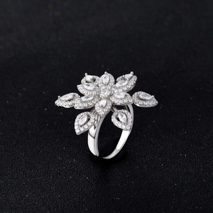 Detailed S925 silver flower ring with marquise micro-pave crystals on black background