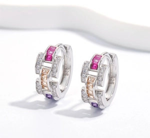 Close-up of S925 sterling silver earrings with colorful zircon stones and micro-pave crystals