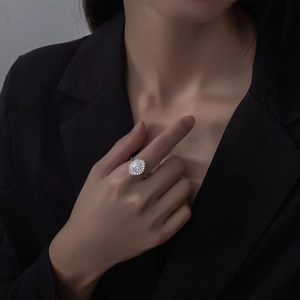 Luxury 925 sterling silver sunflower ring with 6mm moissanite on model wearing black suit