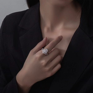 Elegant S925 silver crown teardrop ring with pavé diamonds on a model's hand