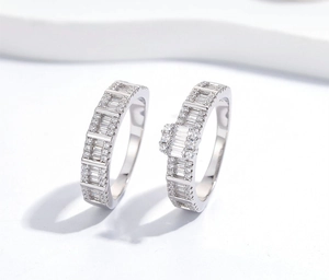 Macro shot of S925 silver rings set with pavé cubic zirconia for elegant wedding styling